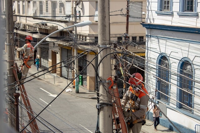 Field service technicians repairing power lines