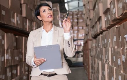 Warehouse manager conducting an inventory audit