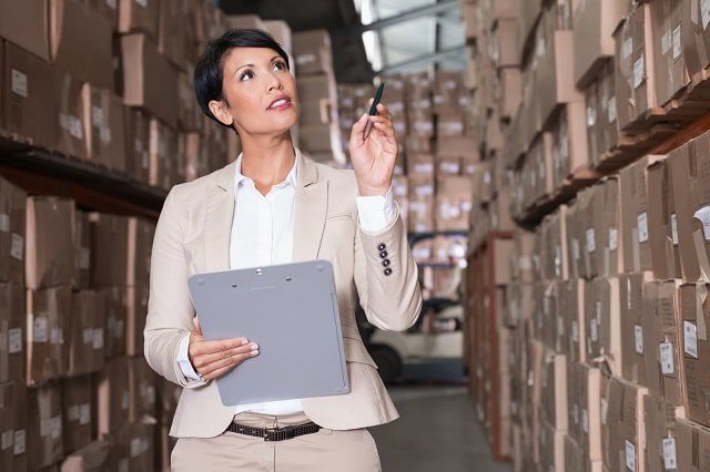 Warehouse manager conducting an inventory audit