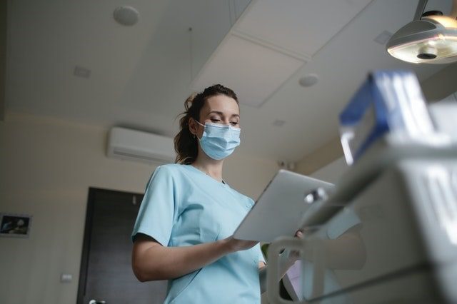 Hospital worker reviewing documentation