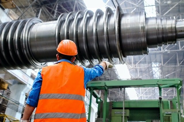 Maintenance manager inspecting equipment