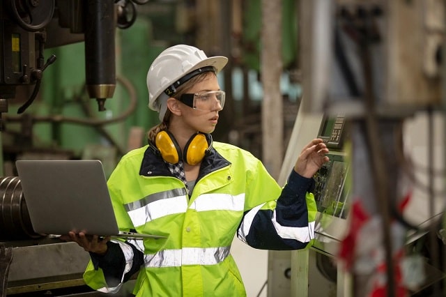 Engineer checking systems in a facility
