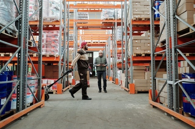 Warehouse workers handling picking tasks