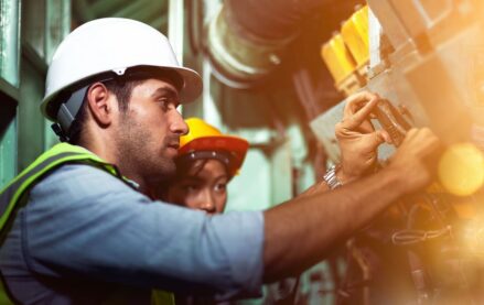 Engineers repairing machinery