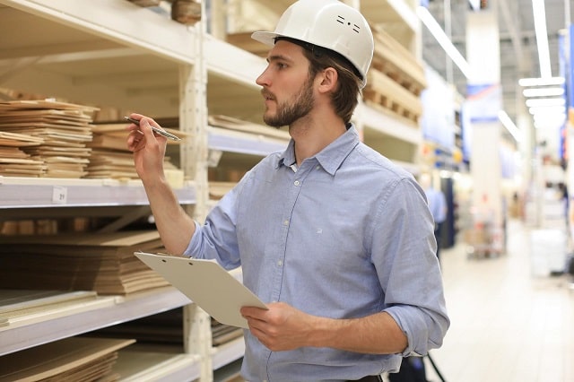 Man conducting inventory count