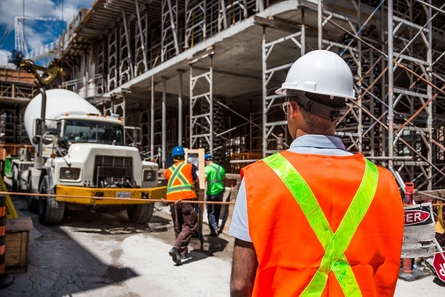 Contractor wearing hard hat at a work site