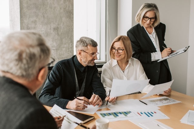 Professional team discussing data in a conference room