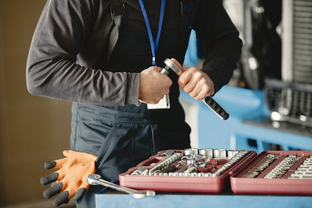Working with tools to perform preventive or corrective maintenance