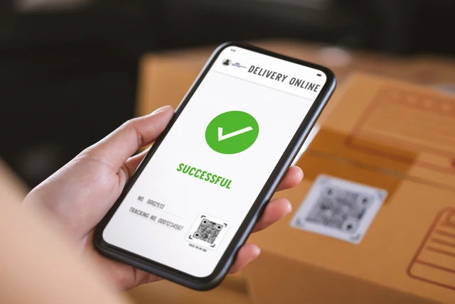 A QR code scanned by a phone