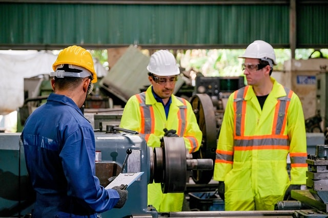 Maintenance team discussing interior equipment maintenance 