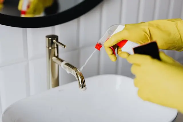 A wash basin being cleaned